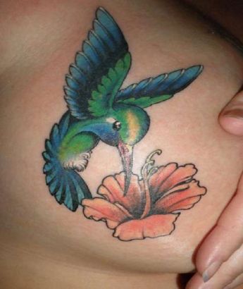 Hummingbird Pic Tattoos On Breast